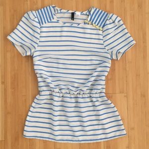 Light blue striped top with gold buttons